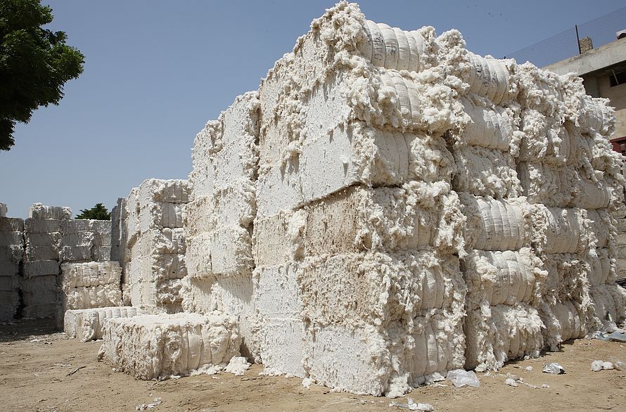Cotton bales in an industrial setting.